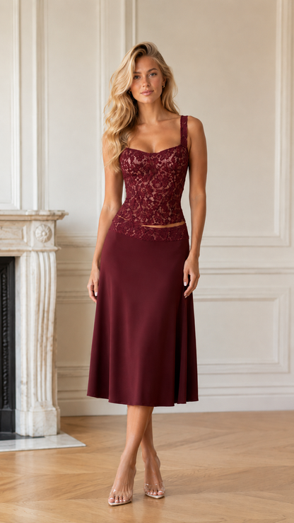 Front view of burgundy lace bodice midi dress with elegant drape