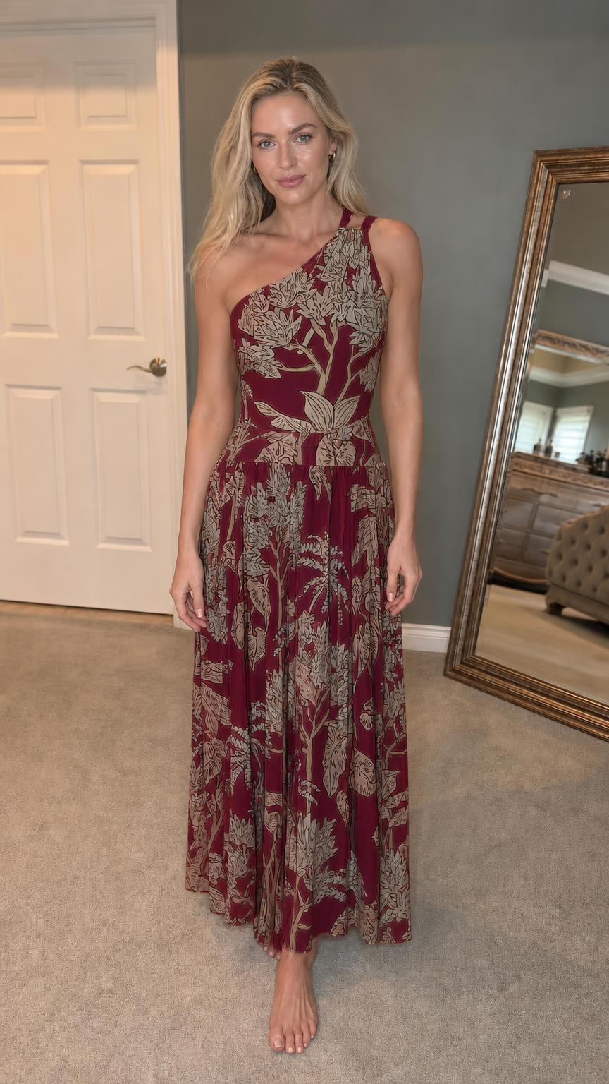 Front view of woman wearing burgundy botanical print maxi dress