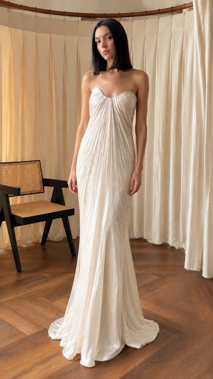 Front view of ivory strapless pleated maxi evening dress