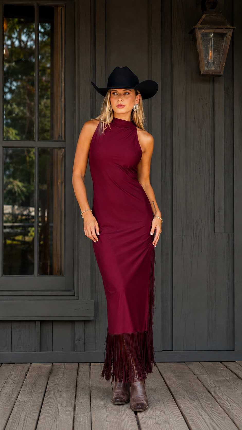 Front view of wine red sleeveless mock neck fringe hem maxi dress