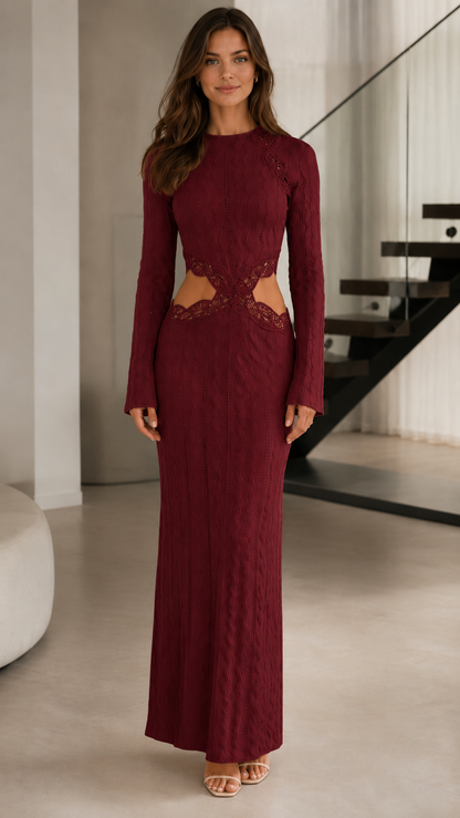 Front view of burgundy long sleeve textured maxi dress with lace-trim waist cutouts