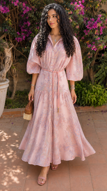 Front view of soft pink floral maxi shirt dress with puff sleeves and flowing silhouette