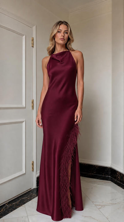 Burgundy satin halter maxi dress with feather trim