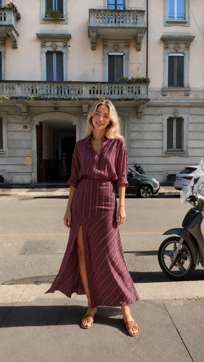 Front view of wine striped maxi shirt dress with flowing maxi length
