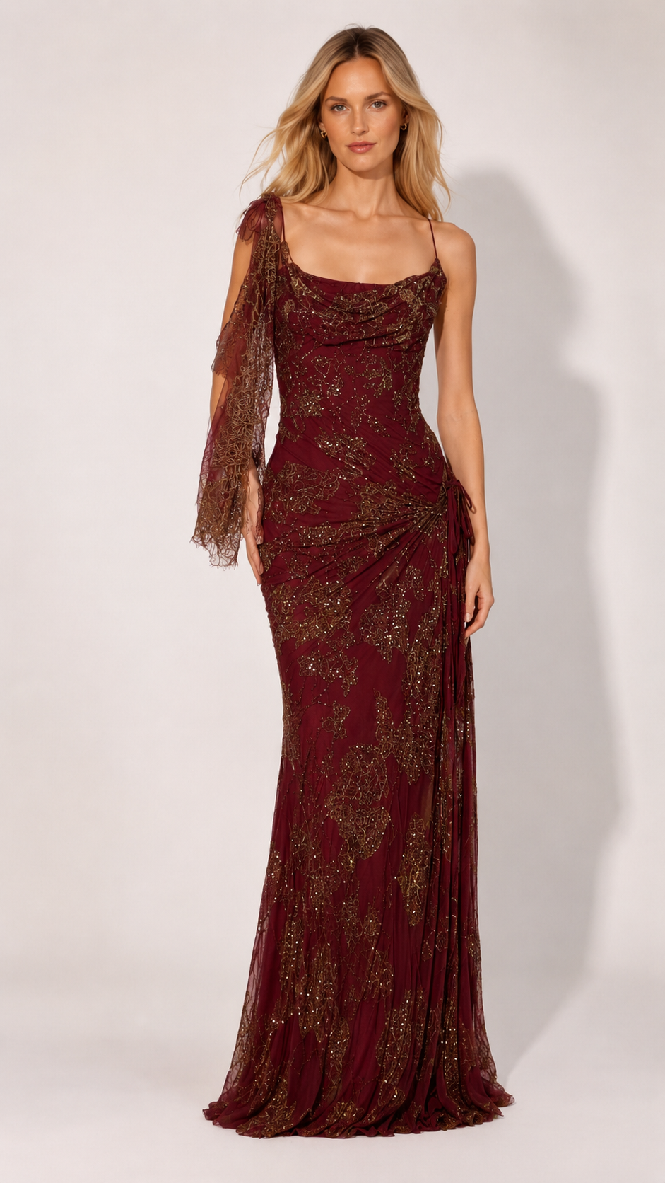 Front view of burgundy shimmer evening gown with draped neckline and side tie detail