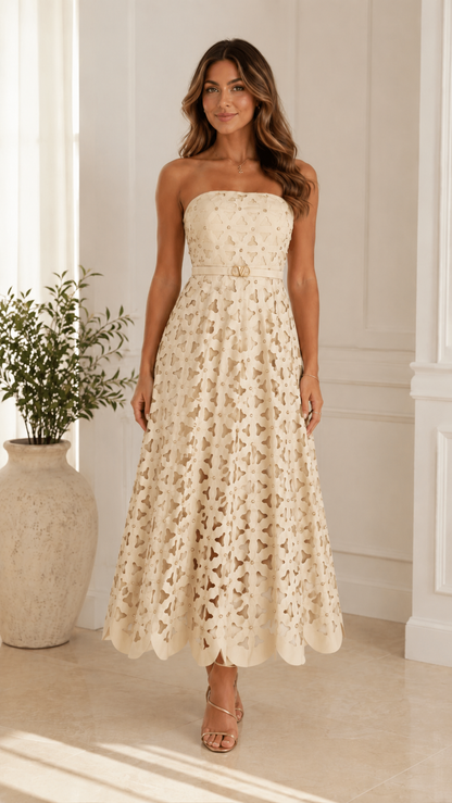 Front view of champagne strapless cutout lace midi dress