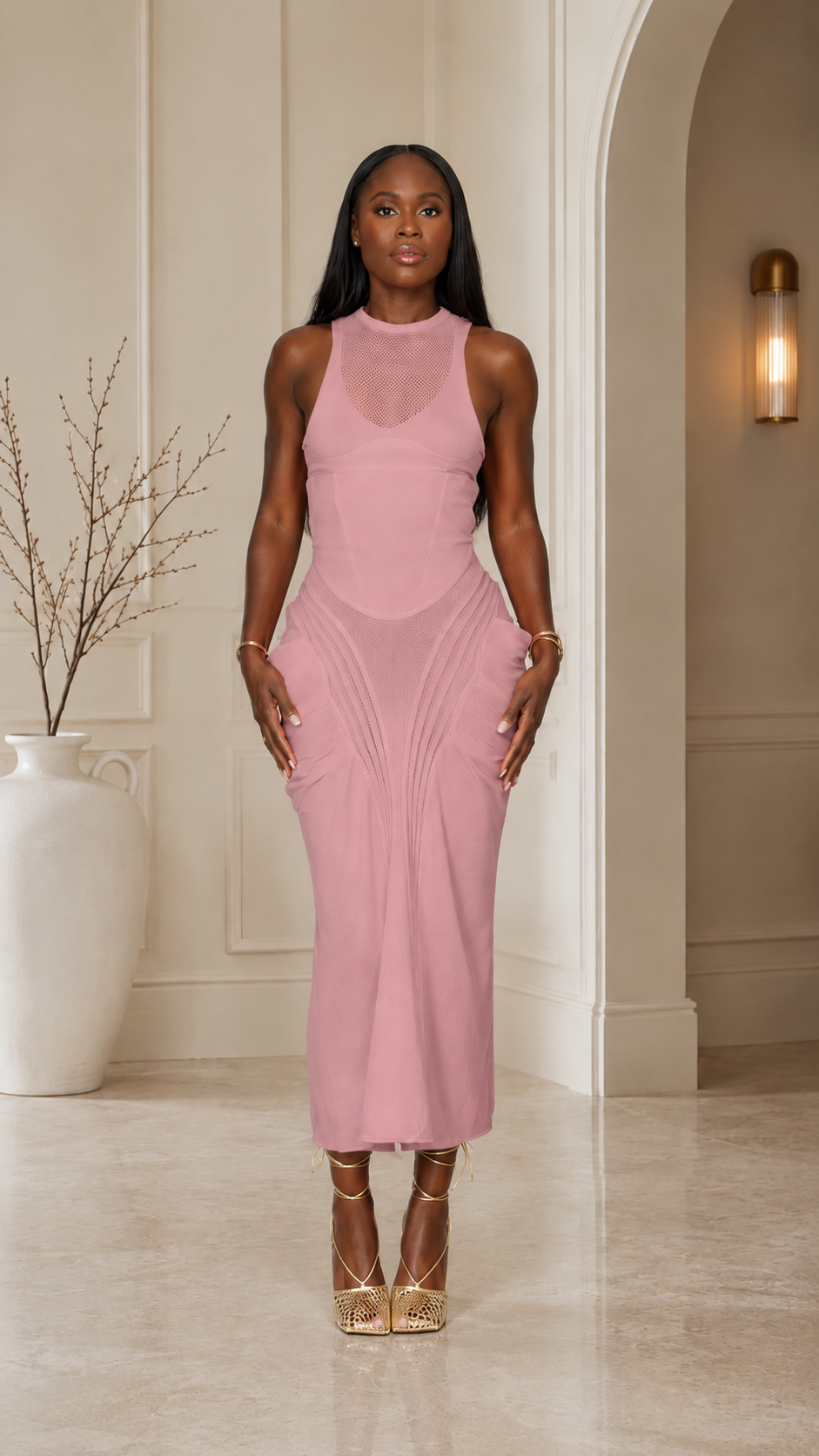 Blush pink sleeveless fitted midi dress with sheer high neck panel front view