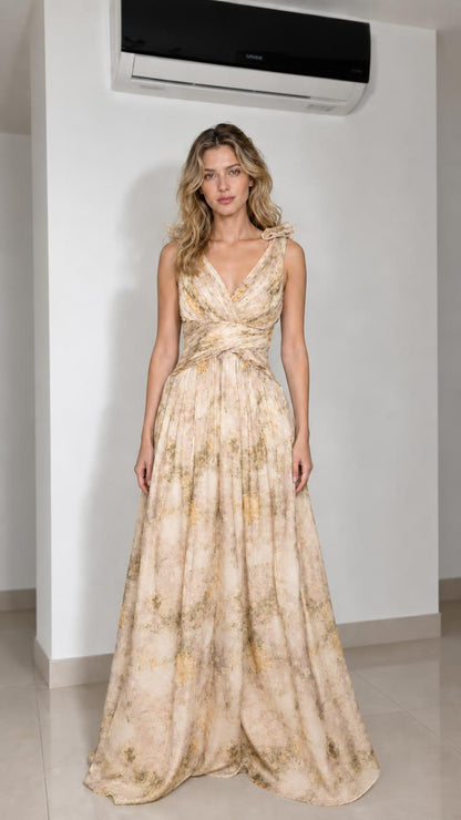 Model wearing champagne floral print maxi dress