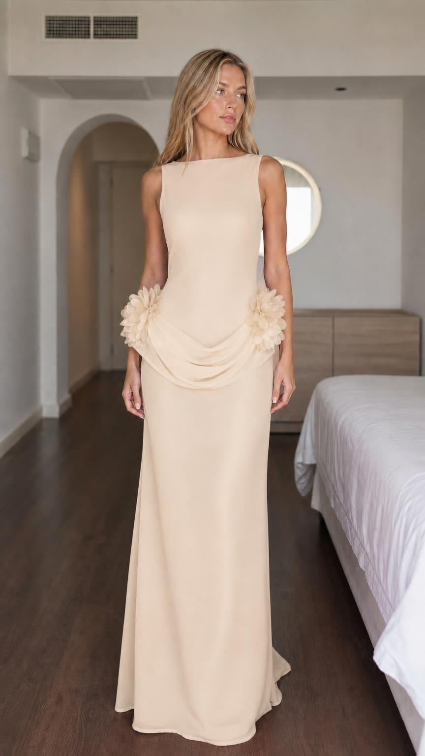 Woman wearing beige formal maxi dress with floral details