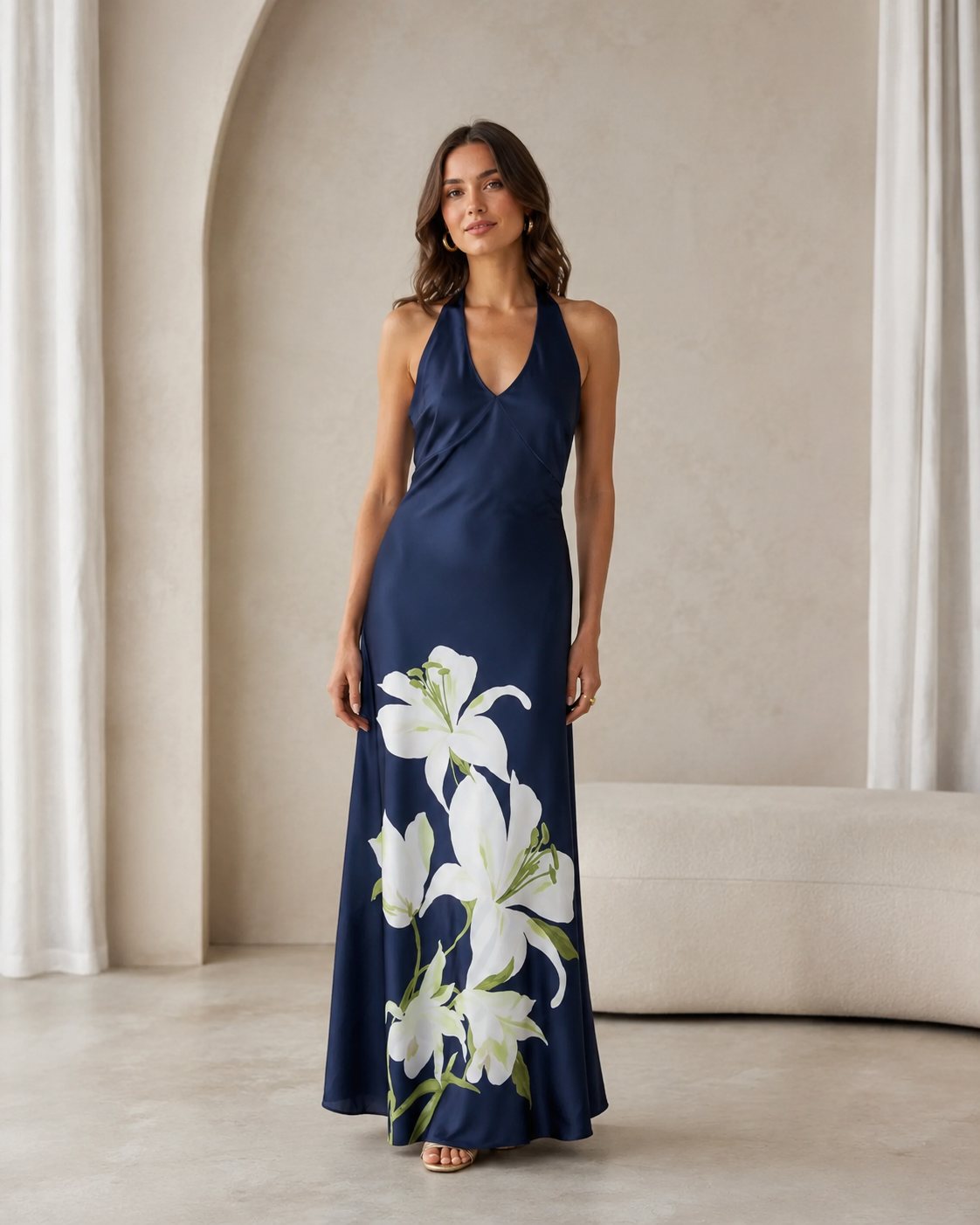 Front view of navy floral halter maxi dress in maxi length
